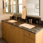 light wood cabinetry with double undermount sink