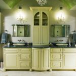 Maple bathroom cabinetry with a granite countertop and two vessel sinks Williams Township, PA
