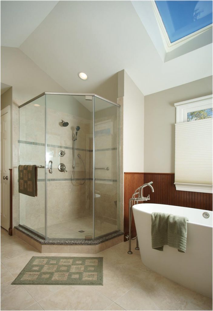 Freestanding bathtub under window and glass shower Center Valley, PA