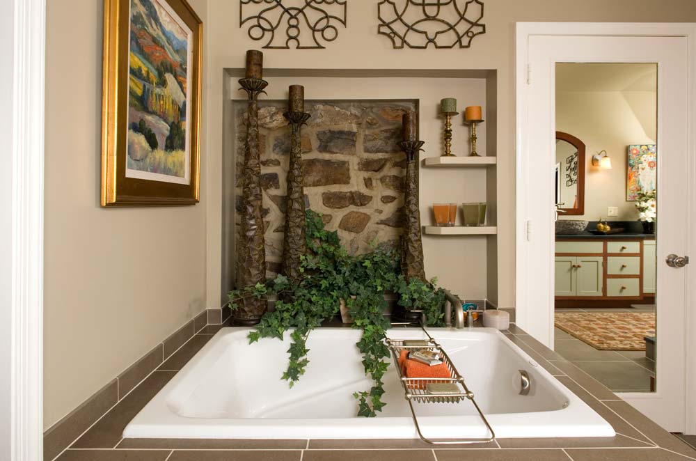 Drop-in bathtub in an oasis with stone and a plant Bethlehem, PA