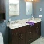 Vanity with brown cabinet doors and two undermount sinks Bethlehem, PA