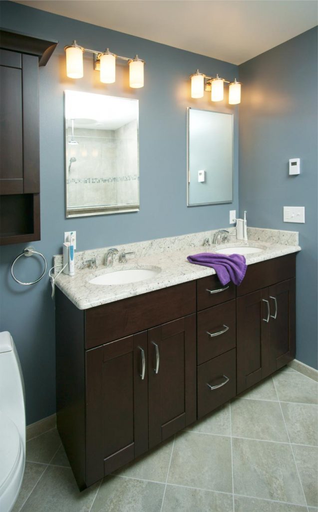 Vanity with brown cabinet doors and two undermount sinks Bethlehem, PA
