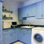 Laundry room with blue cabinets, drop-in sink, and monitor Williams Township, PA