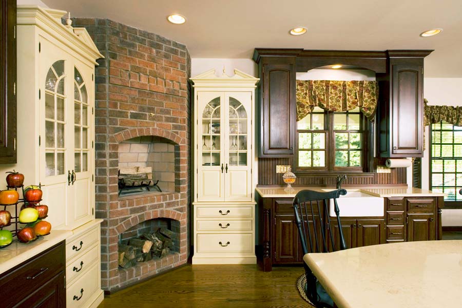 large traditional kitchen with white wood burning oven in macungie pennsylvania designed by morris black designs