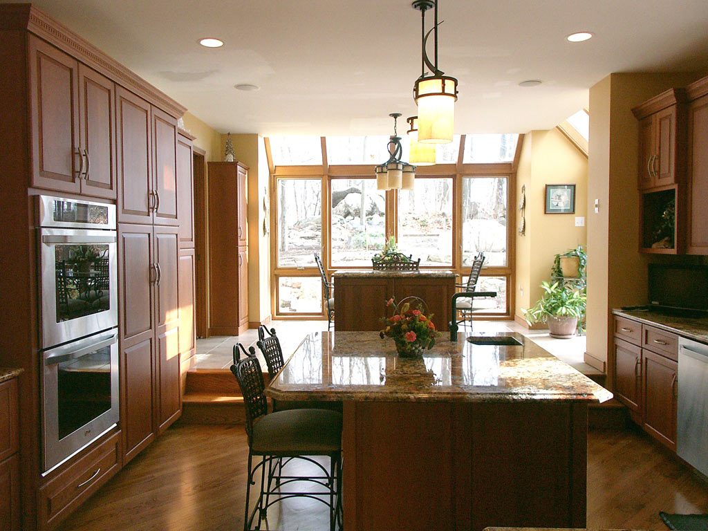 traditional style natural cherry kitchen with granite counter tops and central kitchen island in Allentown pa