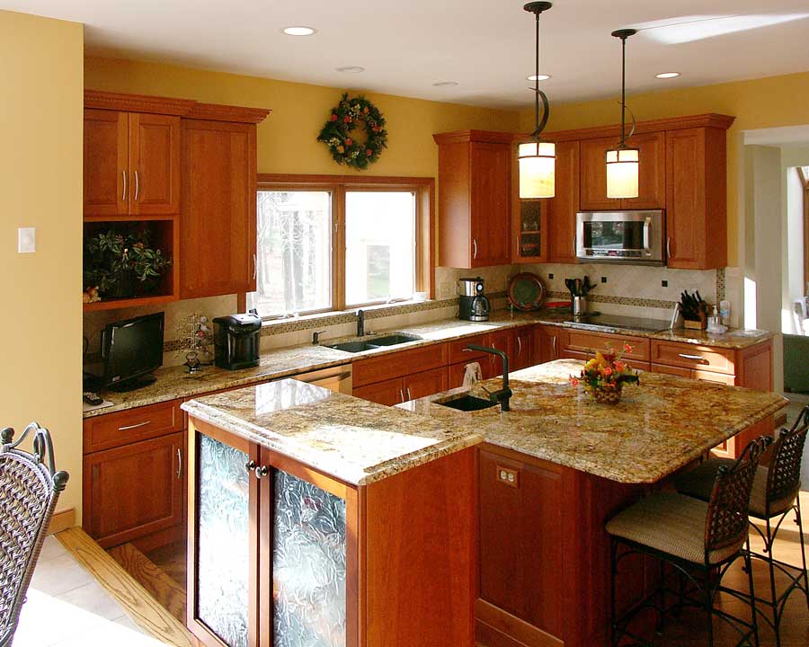 natural cherry kitchen in Allentown pa with granite counter tops and suspended pendant lighting