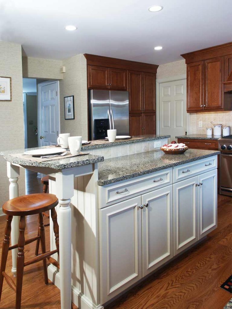 White multilevel island with quartz counter top Center Valley, PA