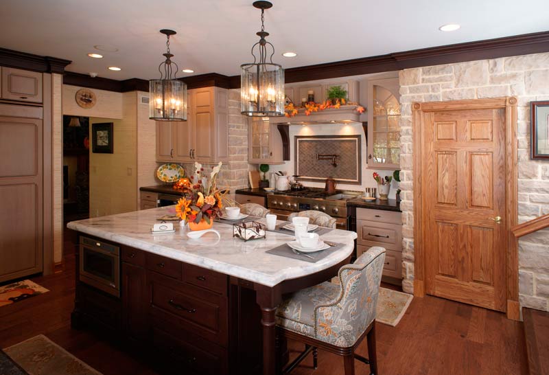 rustic kitchen remodel with stone walls and white oak designed by morris black designs in allentown