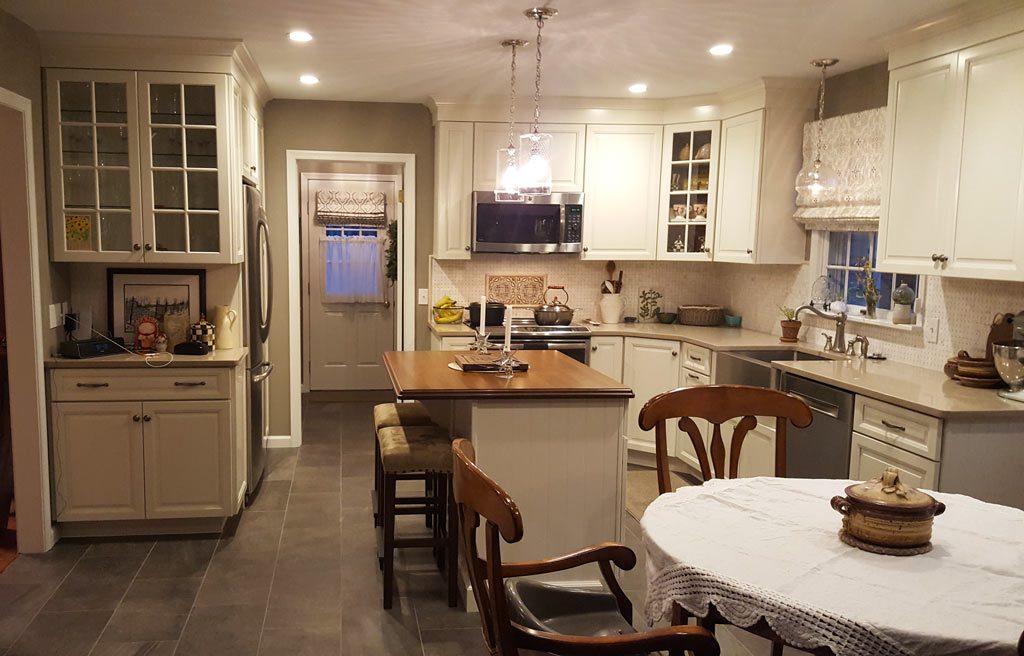 spacious white kitchen renovation with grothouse wood countertop in Bethlehem pa designed by Morris Black Designs