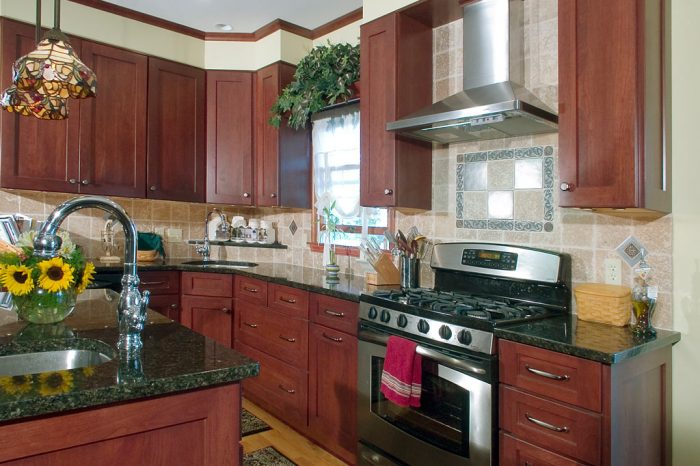 traditional L shaped kitchen in Bethlehem pa with stained cherry yorktowne cabinetry and granite countertops