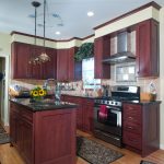 beautiful traditional L shaped kitchen in Bethlehem pa with stained cherry yorktowne cabinetry and granite countertops