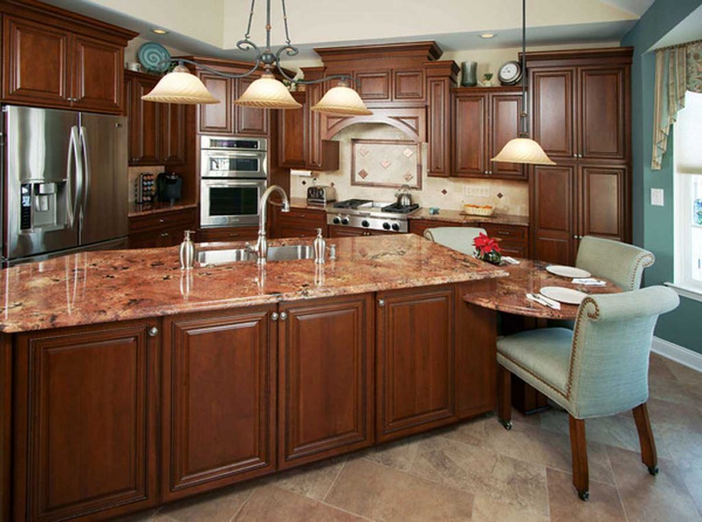 Traditional Old World Influenced Kitchen with cherry cabinetry and granite island top in Macungie Pennsylvania.