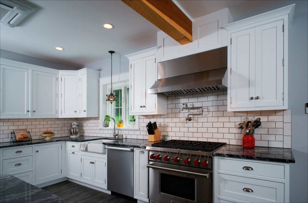 beautiful traditional white kitchen in Allentown PA with stainless steel sub zero wolf range and oven