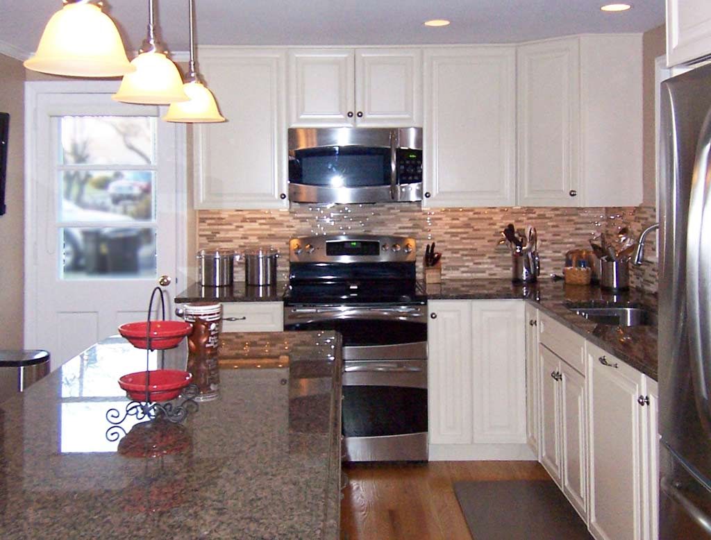 traditional white kitchen with brown granite counter tops in Bethlehem pa created by morris black designs