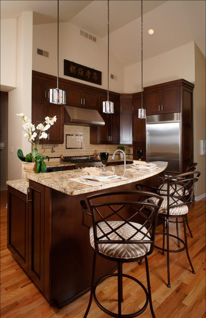 eat in kitchen area with bar stools in transitional cherry kitchen in Easton Pennsylvania Morris Black