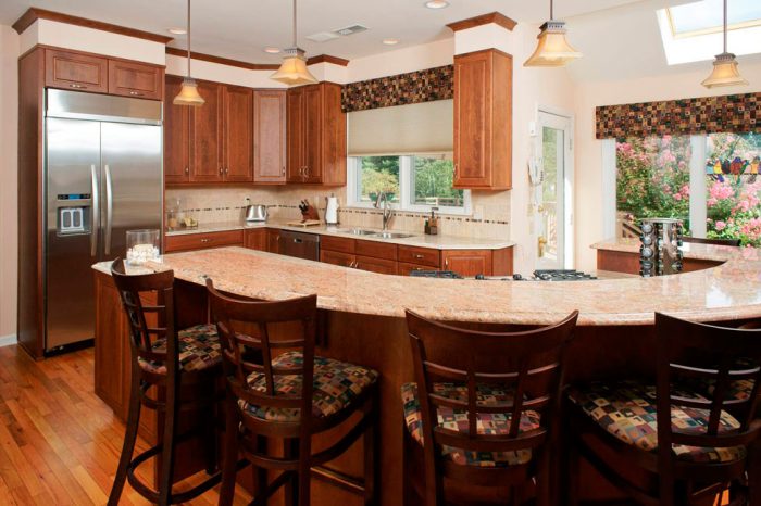 transitional cherry kitchen with granite curved countertop designed by morris black designs in Allentown pennsylvania