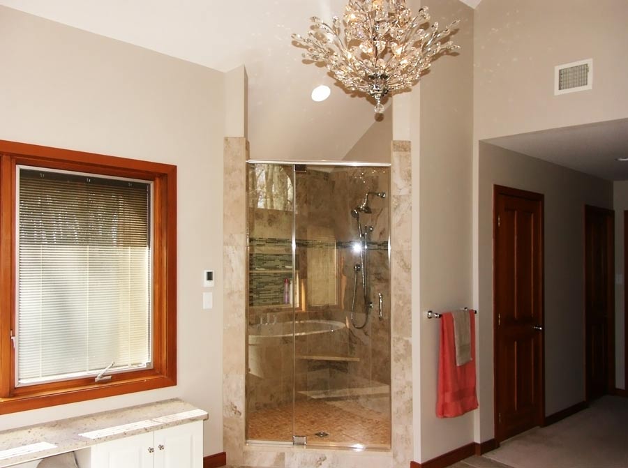 Shower with glass door and window with wooden trim Allentown, PA
