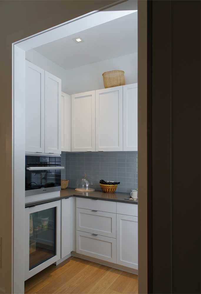 a butlers pantry with white cabinetry for a contemporary kitchen in wyomissing pa