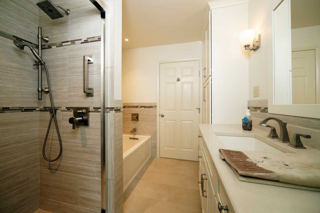 shaker style bathroom with a walk in glass shower and jacuzzi tup