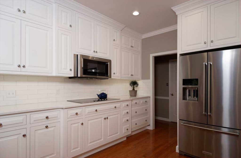 white kitchen cabinets with stainless steel appliances in allentown pa