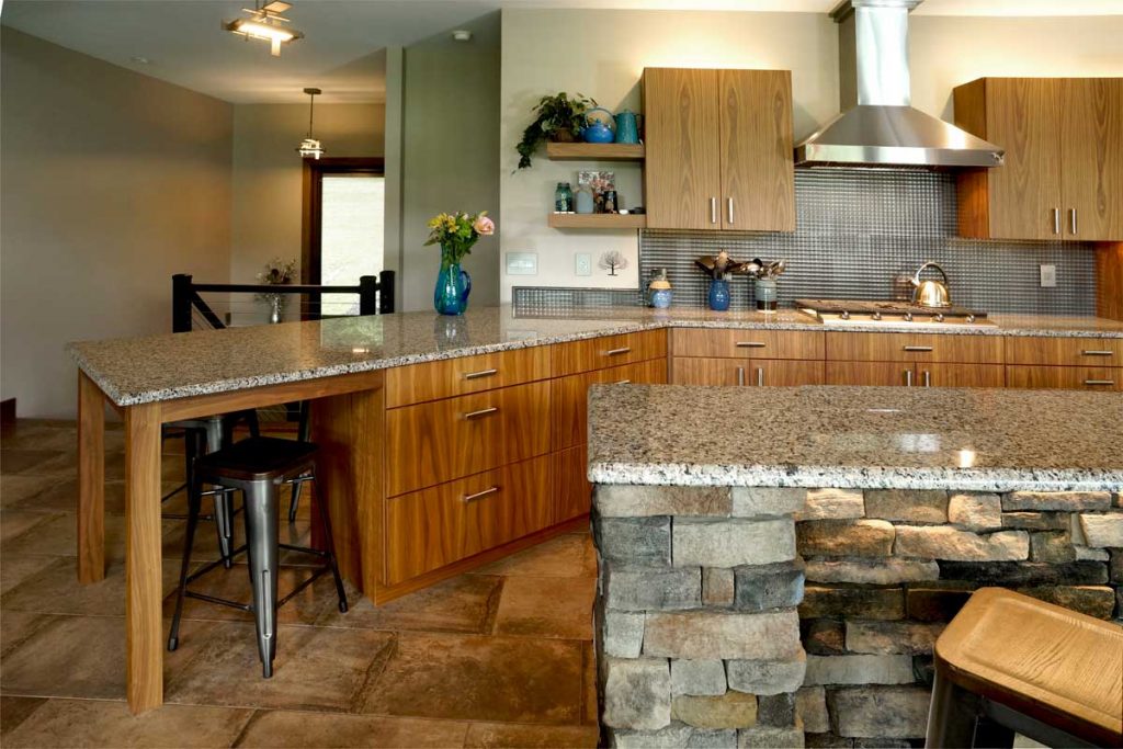 contemporary stone kitchen with two large areas for seating