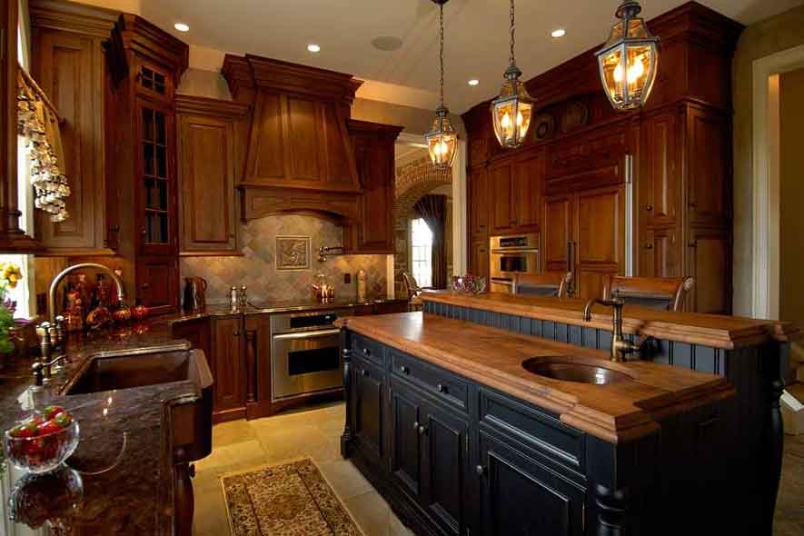 dark blue island cabinet with natural wood surrounding cabinets create two tone kitchen cabinets