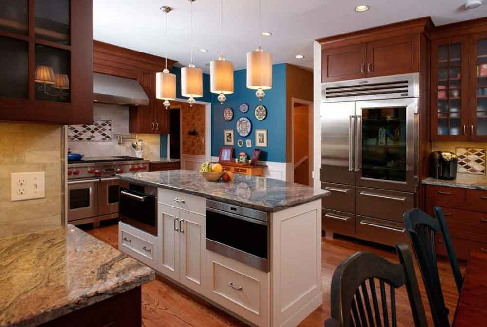 white island cabinets with wood perimeter cabinets create two tone kitchen cabinets