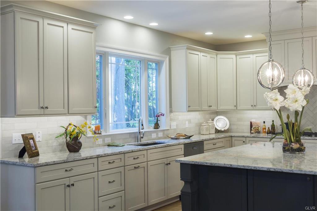 Grey Kitchen Island and White Perimeter Cabinets for a home in Coopersburg, PA