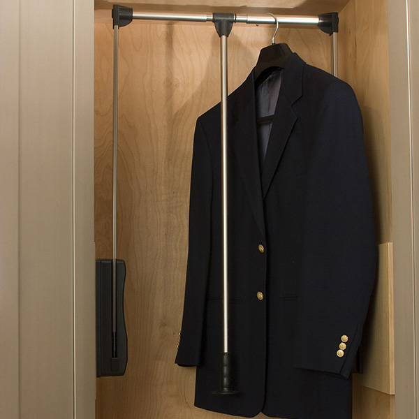 Custom Built Walk-in Closet features a Wardrobe Lift