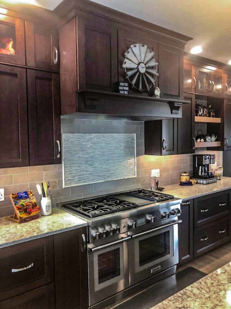 Matching Range Hood and Cabinetry in a Transitional Kitchen