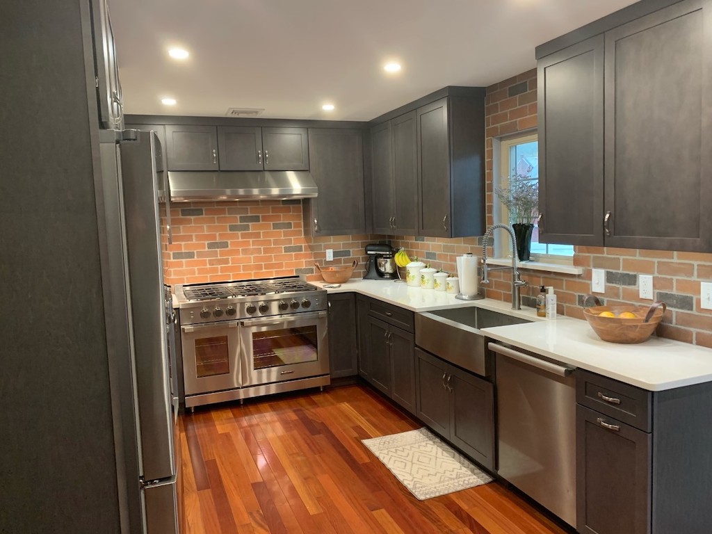 Transitional Kitchen Remodel with Grey Cabinets and Brick Backsplash