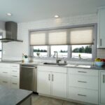 Blanco Contemporary Kitchen with stainless steel appliances and quartz countertops